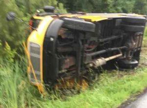 A commercial motor vehicle (CMV) on its side after an accident, symbolizing the need for a CDL attorney in Georgia