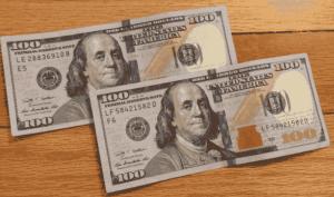 two one hundred dollar bills