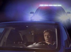 river pulled over at night by police lights during suspected DUI stop in Georgia